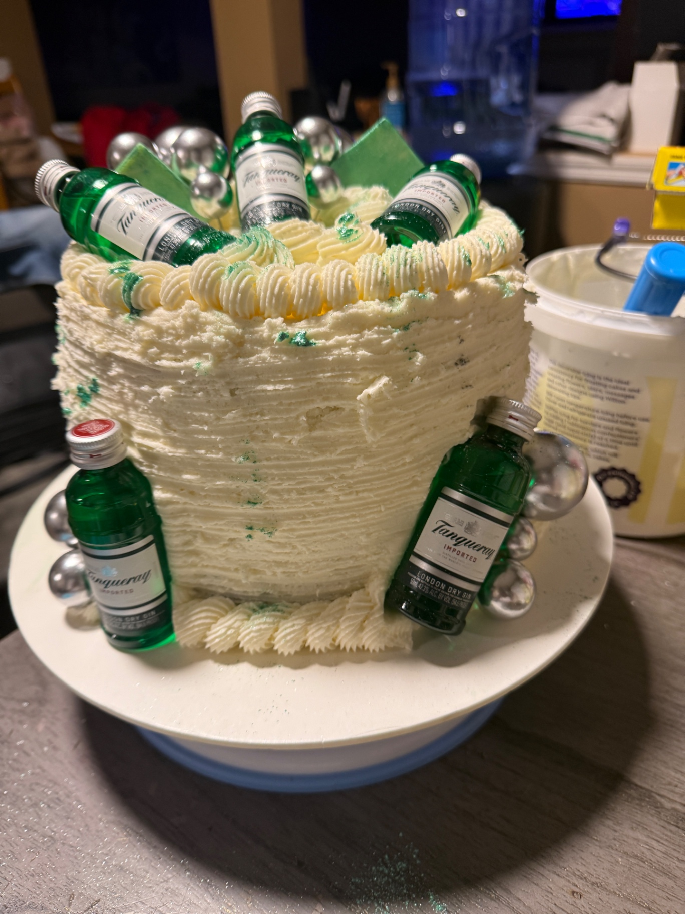 Tanqueray gin bottle cake with silver accents